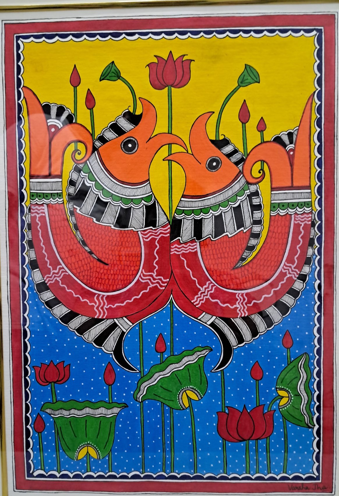 Bharni Madhubani painting of two large patterned fish above a pond of red lotuses and green leaves, on yellow and blue
